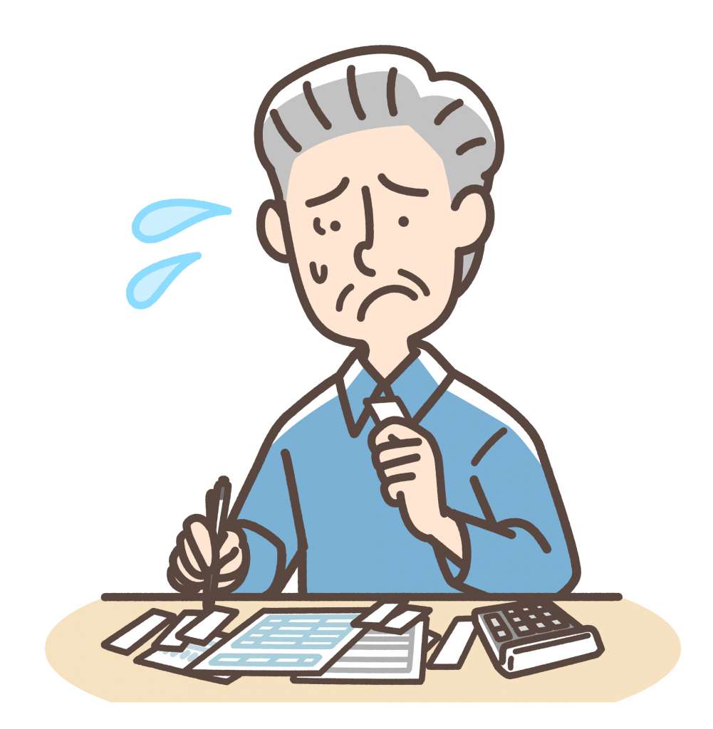 書類作成に手間取る男性