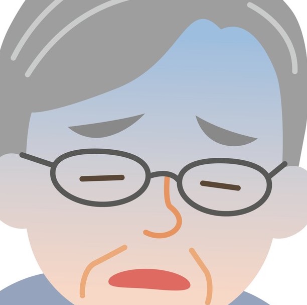 青白い顔の男性